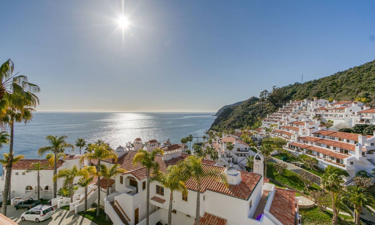 Avalon Condo | 2BR townhome Villa with golf cart and Ocean Views from Every Room!