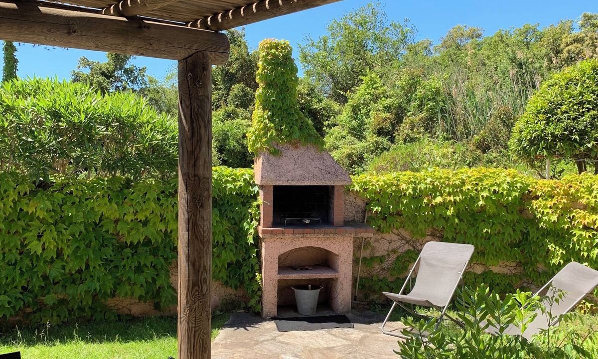 Santa Giulia House | Mini villa private garden 150 meters from the beach
