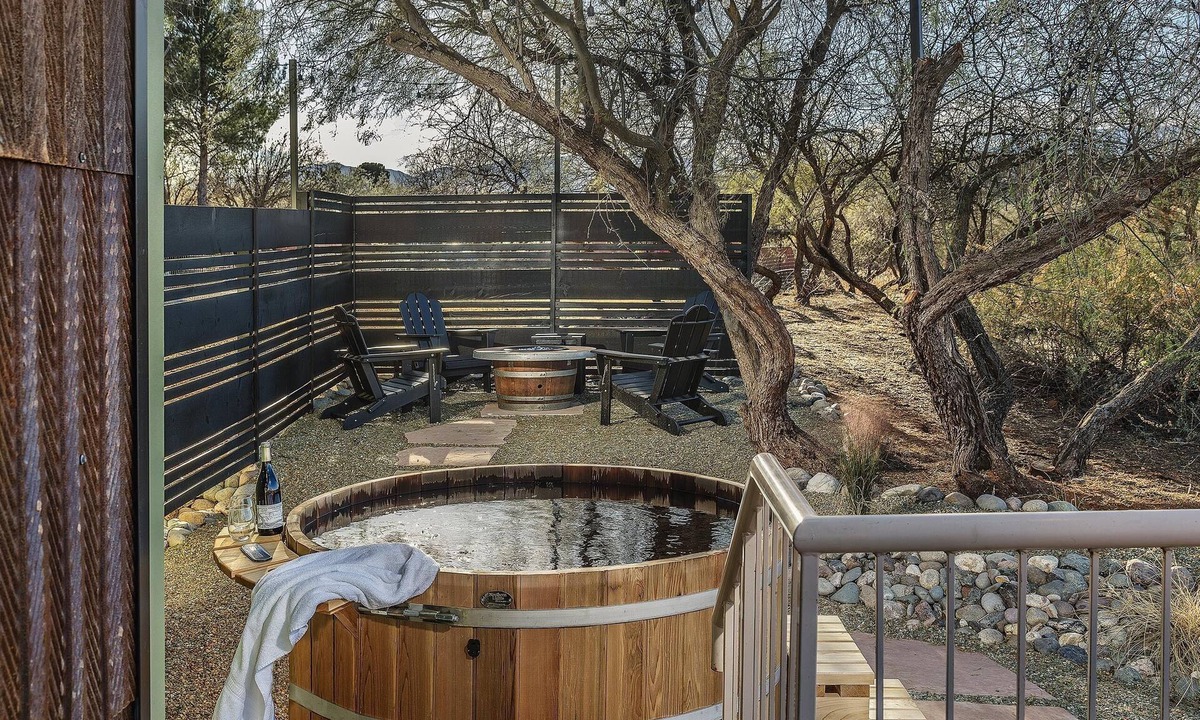 Cornville House | Pictures do not do it justice. A breathtaking creekfront home on a hill overlooking Oak Creek, with room for 9, a secret bookshelf door, hot tub, and fire pit. Peaceful Cornville wine country, 25 min to Sedona.