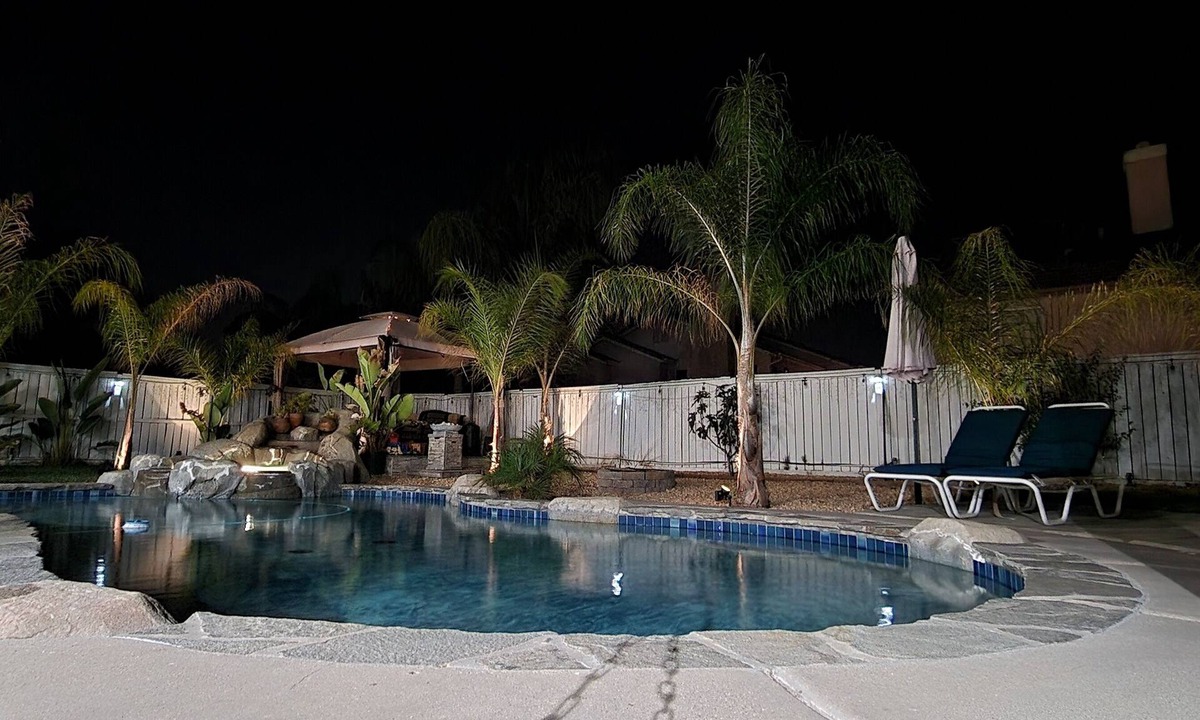 Temecula House | Private master Bedroom with tropical garden and pool view