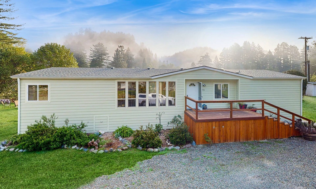 Crescent City House | Riverfront getaway with firepit, deck, fireplace, full kitchen, W/D, & WiFi