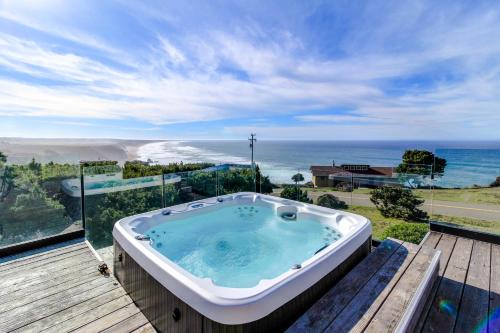 Manchester House | Stunning ocean view home with hot tub and deck