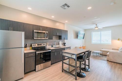 Maryvale Village Apartment | Sunlit 2BR-1BR-Studio Oasis, King Bed, Pool, Gym, Tub, BBQ grill, EV