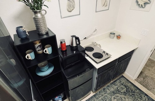 Santee House | A cozy room with private bathroom and mini kitchen