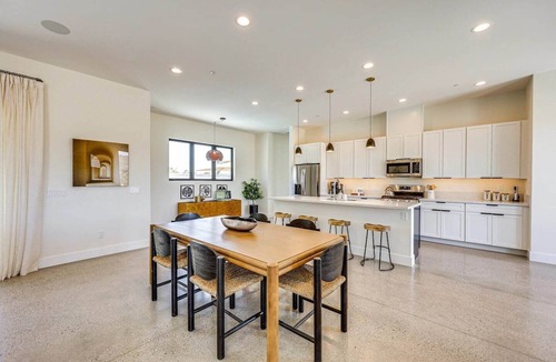 Yucca Valley House | A serene luxury desert retreat near Joshua Tree National Park with panoramic mountain views, a private pool and spa, an open-air rain shower sanctuary, and an expansive stargazing patio in the Mojave Desert.