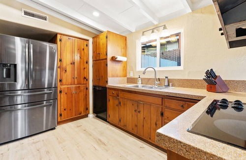 Bay Park House | Bay Park Retreat with Backyard Fire Pit, Hot Tub, Ping Pong & Cornhole