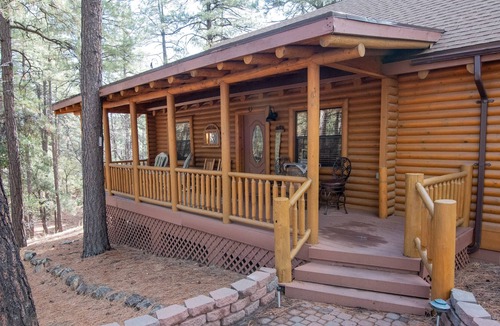 Highland Pines House | Beautiful Log Cabin on an acre in the tall pines with fenced yard for dogs!