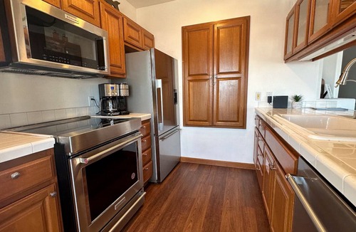 Avalon Condo | Beautifully Remodeled Premium Ocean View Condo with Fireplace and Golf Cart!