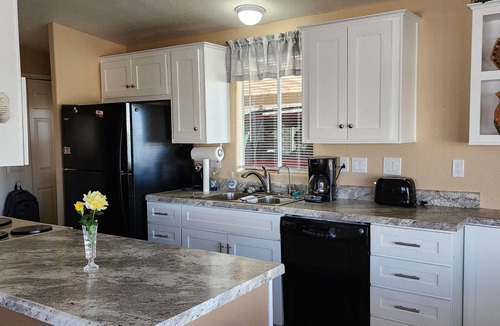 East Mesa House | Charming 2-bedroom 2 bath house with AC in a gated 55 and over community in Mesa