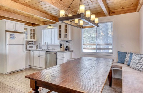 Chamberlands House | Classic Tahoe cabin charm with partial lake views, Chamberlands amenities, and year-round adventure just minutes away.