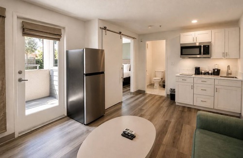 Little Italy Hotel | Colorful Artistic Suite with Balcony Views – Sustainable & Walkable | 4 Units