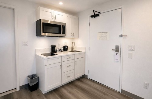 Little Italy Hotel | Colorful Artistic Suite with Balcony Views – Sustainable & Walkable | 4 Units