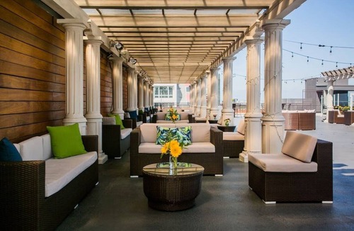 Little Italy Hotel | Colorful Artistic Suite with Balcony Views – Sustainable & Walkable | 4 Units