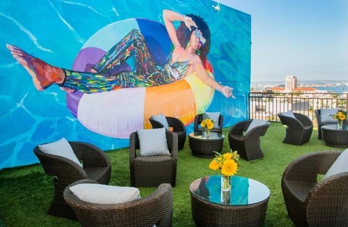 Little Italy Hotel | Colorful Artistic Suite with Balcony Views – Sustainable & Walkable | 4 Units