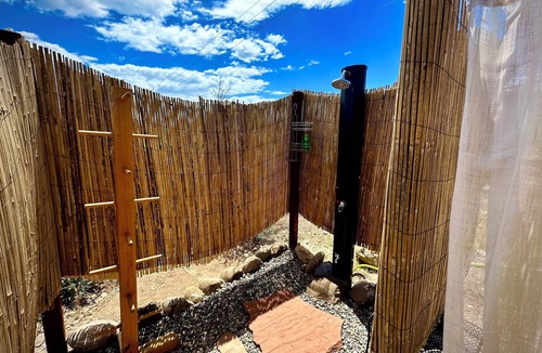 Rimrock RV Rental | Cozy Cliffside Cabin with Private Creek Access at Sacred Springs