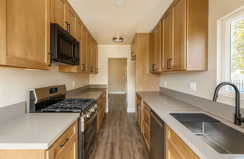 Lawndale House | Cozy Playhouse Retreat with Private Yard & Theater Lounge
