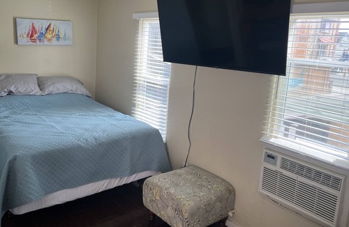 Sunset Beach Apartment | Cozy Sunset Beach Studio with Peek A Boo Ocean Views (Second Story/Dog Friendly)