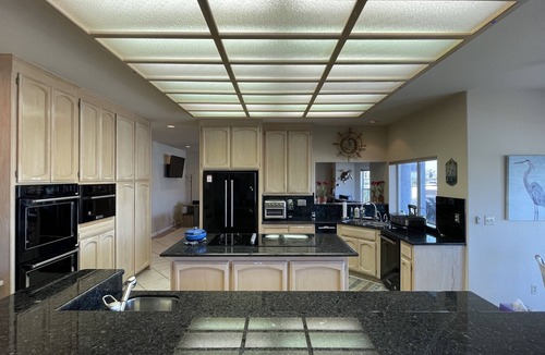 Discovery Bay House | Deep Water Boat House with Sunset View
