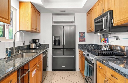 Desert Park Estates House | Fiesta De Aqua – Playful Palm Springs Oasis with Pool, Spa, Putting Green & Mountain Views