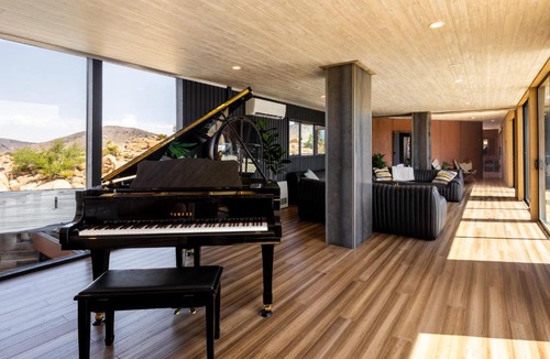 Yucca Valley Villa | Iconic 7,000sf Glass Villa with 2 Pools on 350 Acres