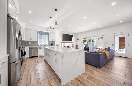 Mid City House | Lux 5BR Retreat: Pool & Firepit + Private Rooftops