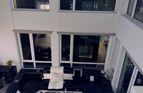 Produce and Waterfront Apartment | Luxury Loft Floor-to-Ceiling Windows
