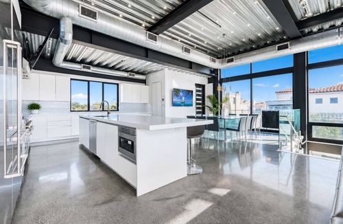 Silver Strand House | Marina del Rey Canal-Front Modern Estate w/Rooftop Pool, Spa & Theater