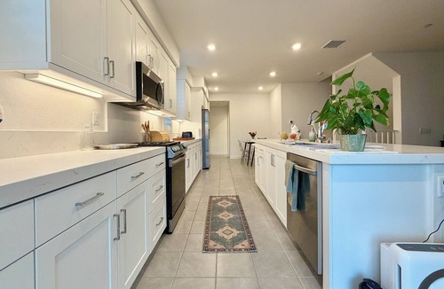 Northwest Anaheim House | Massive Townhome with Huge Home Theater and Gym