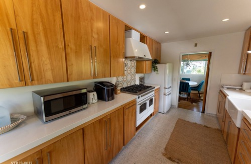 Lantern District House | Mid-century modern home with Epic Coastline Views! STR23-0037