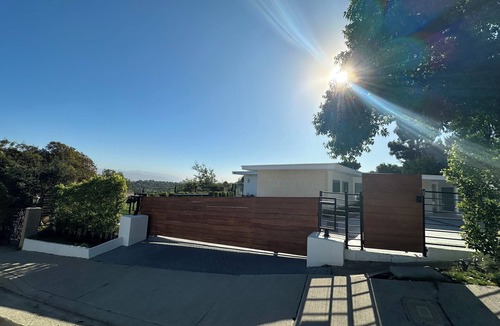 Encino House | Mid-century modern pool estate with jetliner views in luxury celebrity hills