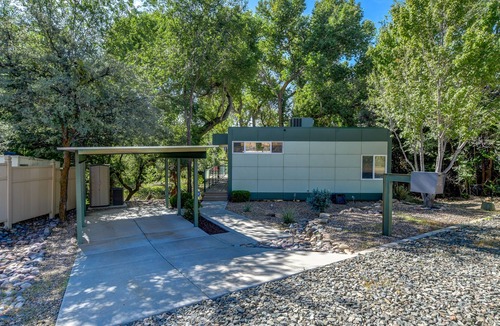 Diamond Valley Cabin | Modern cabin hidden among the trees- Unwind and relax on the porch creek-side.