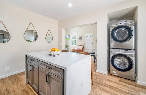 East Village House | Modern downtown home with fast WiFi, central AC, washer/dryer - near the ocean