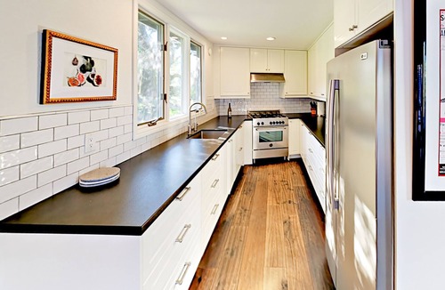 Santa Rosa House | Mountain-view oasis with hidden garden patios - walk to trails & lake