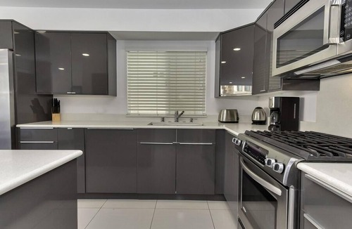 West Newport Condo | New Condo With Ocean View - Bottom unit