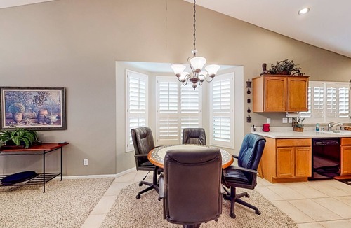 Oakwood House | Palm-lined home with pool access, grill, office & golf course views