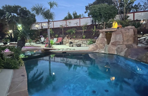 Oak Park House | Private oasis in backyard, beach entry solar heated pool, jacuzzi & water slide