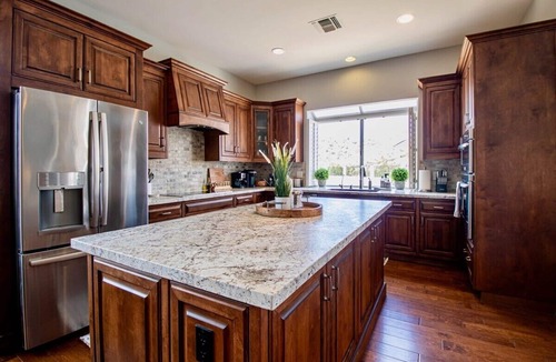 Mountain Park Ranch House | Relax and recharge at this stylish desert retreat with views of rolling desert hills. Enjoy sunsets from the heated pool, dine outdoors, or unwind with a few on the putting green. Perfect for long stays—just 15 minutes from the airport!
