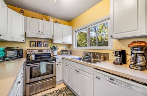 Northwood Cabin | Riverdale- w/seasonal dock/boats, hot tub, large yard, dog-friendly!