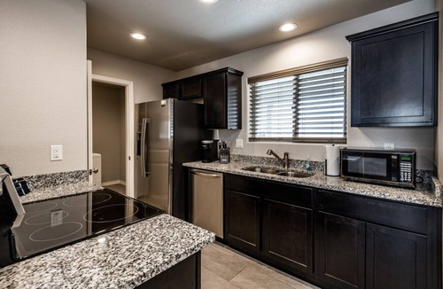 Kingman House | Sleek & Modern Triplex | Private Yard & Top Amenities