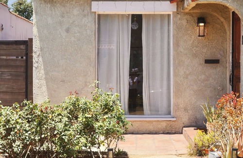 Mid-Wilshire House | Spanish Oasis in Miracle Mile w/Backyard