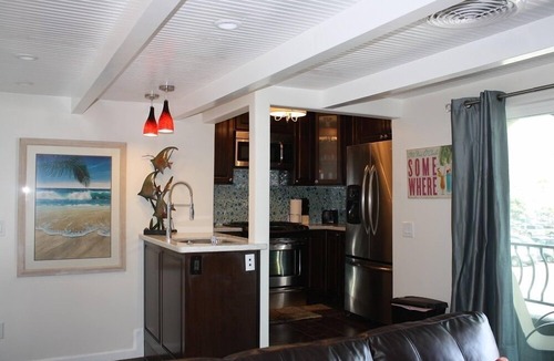 Mission Beach Apartment | Steps to the Beach, located at the Boardwalk and across from Belmont Park
