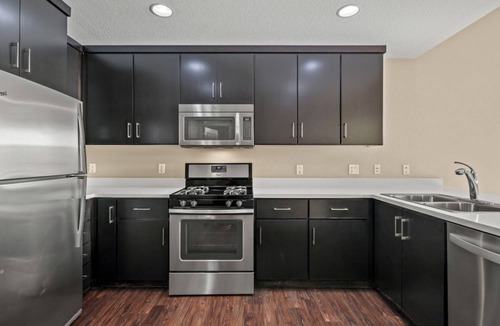 Pilgrim - Triton Condo | Stylish 2BR Plaza Retreat with Pool