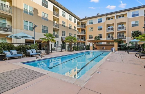 Pilgrim - Triton Condo | Stylish 2BR Plaza Retreat with Pool