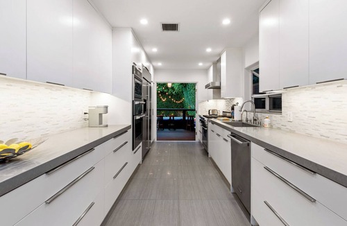 Tri-West House | Stylish West Hollywood Retreat Poolside Bliss with detached Guest House