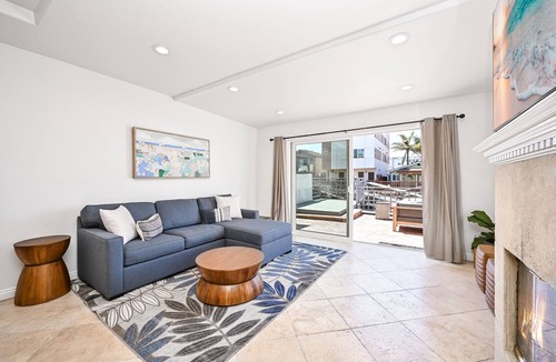 Sunset Beach House | Sunset Island Waterfront Home with Kayaks across the Street from the Beach