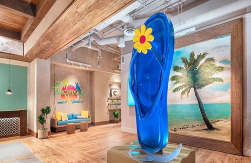 East Village Hotel | Unwind in a Tropical-Themed Room with Festive Vibes