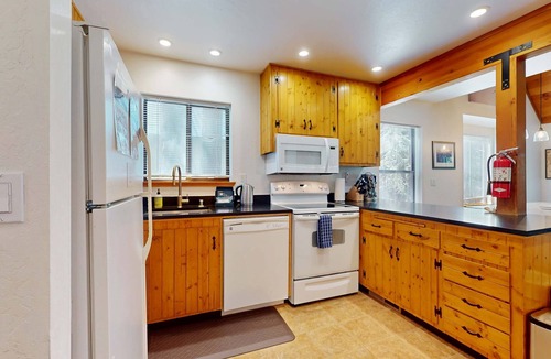 Truckee House | Updated home on quiet street with gas fireplace, shared hot tub, pool, & more