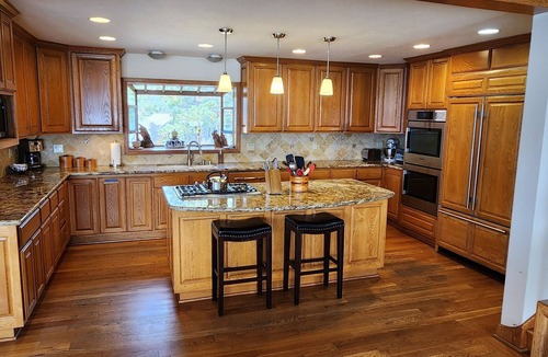 Elk Point House | Breathtaking Lakefront Home- Private beach-Fabulous sunsets-Paddleboards & canoe