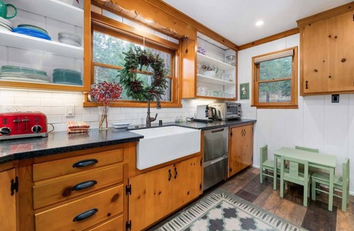 Boulder Bay House | Waterfront. Gameroom, Dock in water. Spa. Firepit.