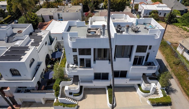Architectural Townhouse with Panoramic Ocean and Mountain Views
